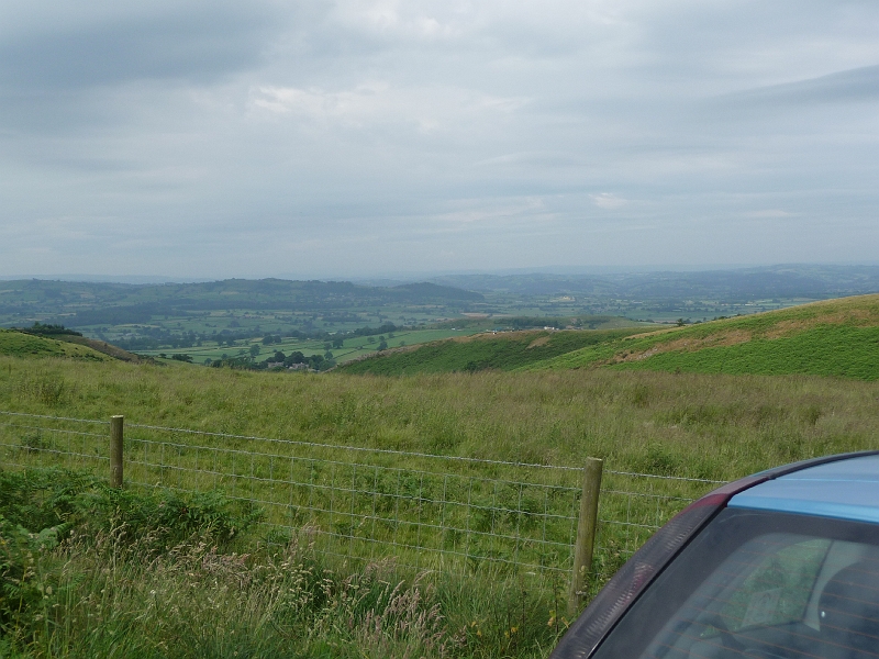 P1000369.JPG - Looking west towards Montgomery and Wales beyond